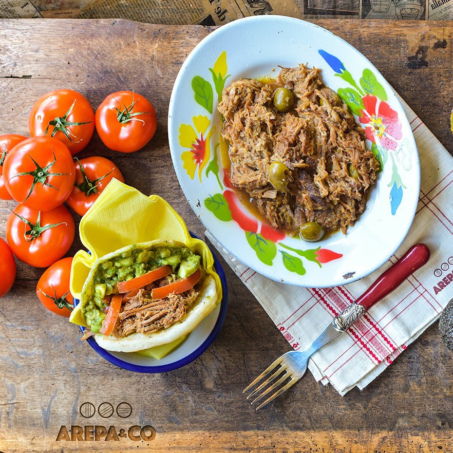 Heating Up Our Shredded Beef, Pork, Asado Negro and Beans - Arepa & Co - Venezuelan Restaurant